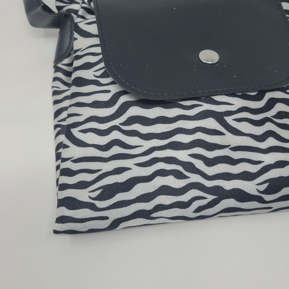 Ashley Stewart | Women's Three-in-One Animal Print Small Handbag to Tote Bag - Picture 2 of 8